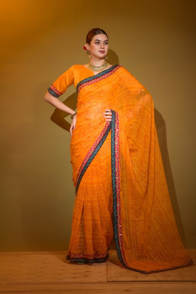 Mira Heavy Georgette Foil Print Work Saree (Orange)